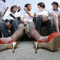 Nathan Gaddy, Andy Bruce, Krista Green and Michael Crouse talk before beginning Walk A Mile In Her Shoes on Friday.