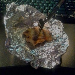 "This person gnawed this hunk of chicken while furiously responding to emails."